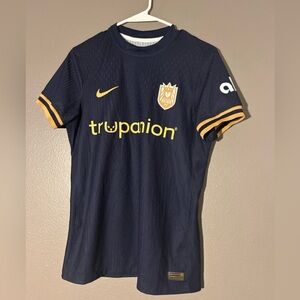 Nike men’s Dark Blue Jersey with Gold Accents